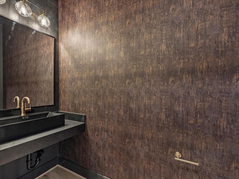 The designer half bathromm is sure to wow your guest