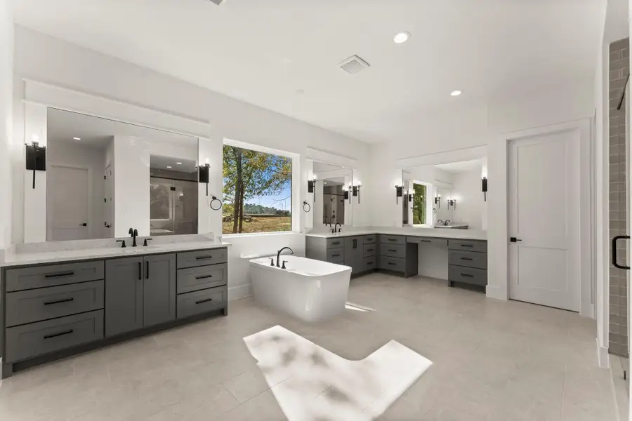 Furnished interior view inside a new home in Homestead Hill, New Waverly (Image 3).