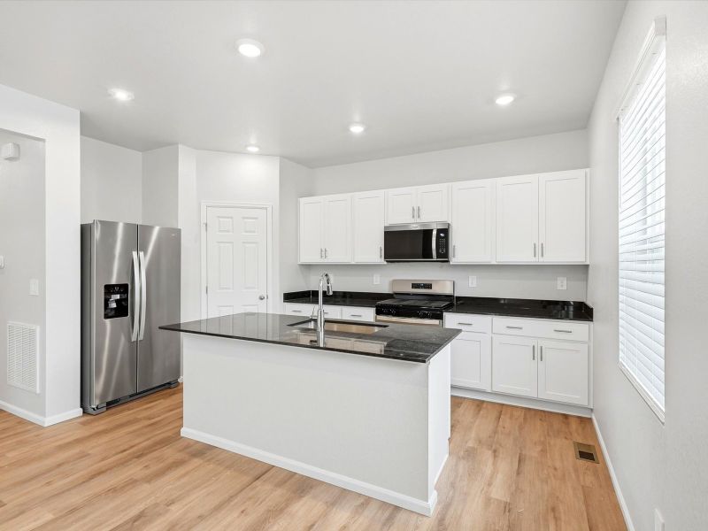 Furnished interior view inside a new home in Revere at Johnstown, Johnstown (Image 4).