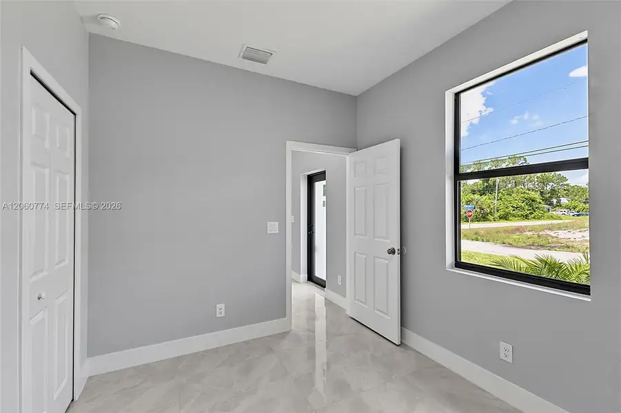 Spacious, unfurnished interior of a new home in , Lehigh Acres (Image 26). Spacious, unfurnished interior of a new home in , Lehigh Acres (Image 26).