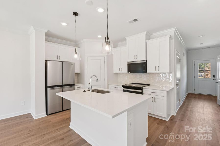 Photo is not Photo is not of the actual home, but is an inspirational photo of builder’s model home and may depict options, furnishings, and/or decorator features that are not includedof the actual home, but is an inspirational photo of builder’s model home and may depict options, furnishings, and/or decorator features that are not included