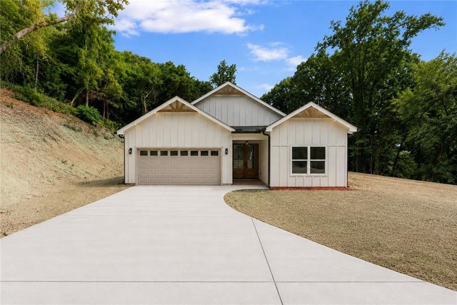 Front exterior of a new home in , Gainesville, GA, highlighting curb appeal (Image 26).