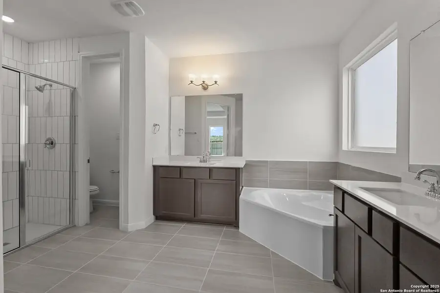 Furnished interior view inside a new home in Megan's Landing, Castroville (Image 6).