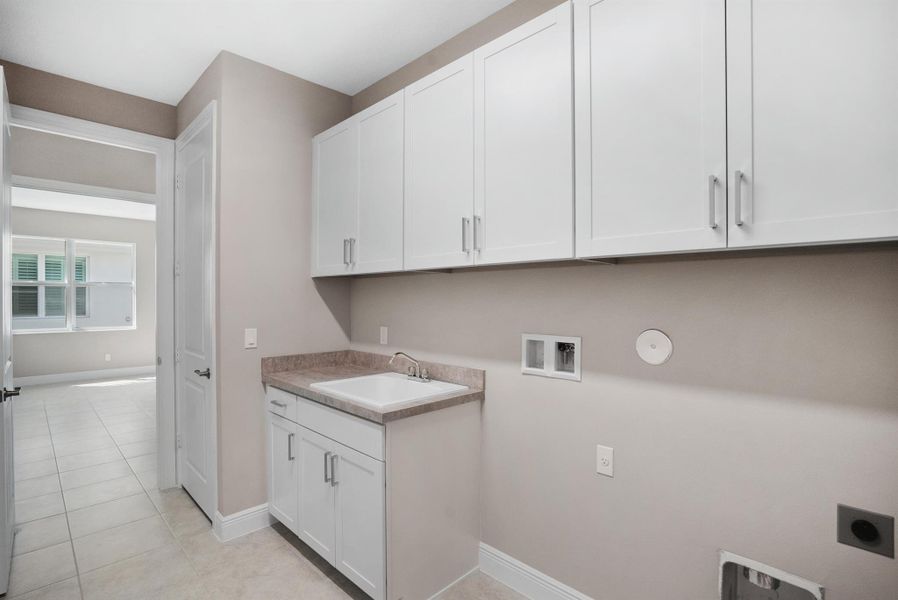 Furnished interior view inside a new home in Lake Park at Tradition, Port St. Lucie (Image 7).