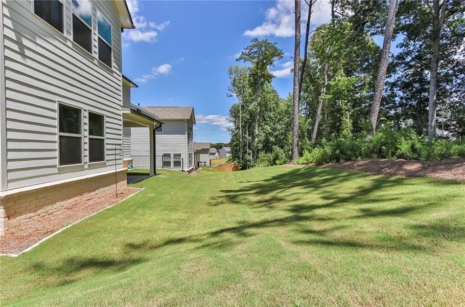 Exterior details and patio area of a home in Bailey Fence, Dacula (Image 25).