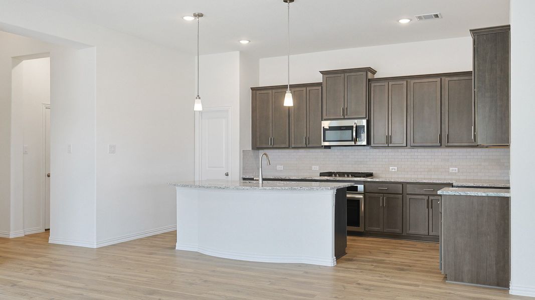 Furnished interior view inside a new home in Southern Pointe, College Station (Image 3).