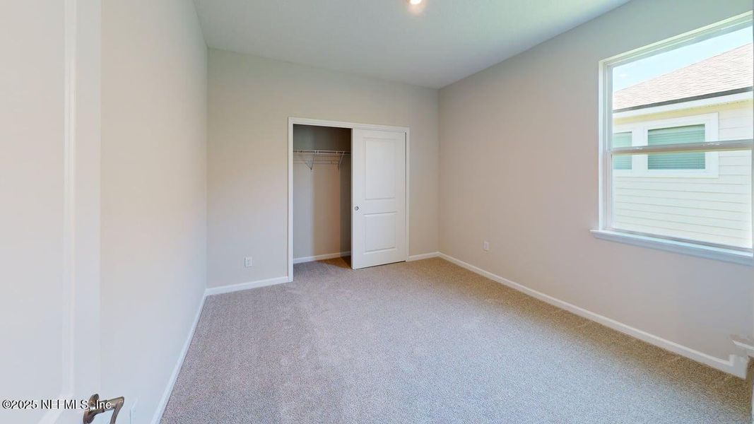 Spacious, unfurnished interior of a new home in Lakes at Bella Lago, Green Cove Springs (Image 13).