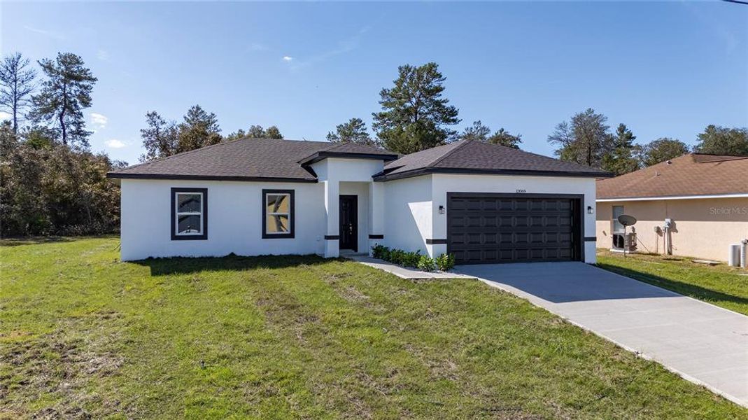 Front exterior of a new home in , Ocala, FL, highlighting curb appeal (Image 20).