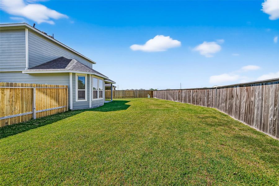 Exterior details and patio area of a home in Anderson Lakes, Houston (Image 22). Exterior details and patio area of a home in Anderson Lakes, Houston (Image 22).
