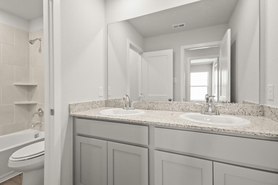 Furnished interior view inside a new home in Caney Mills, Cut and Shoot (Image 10).