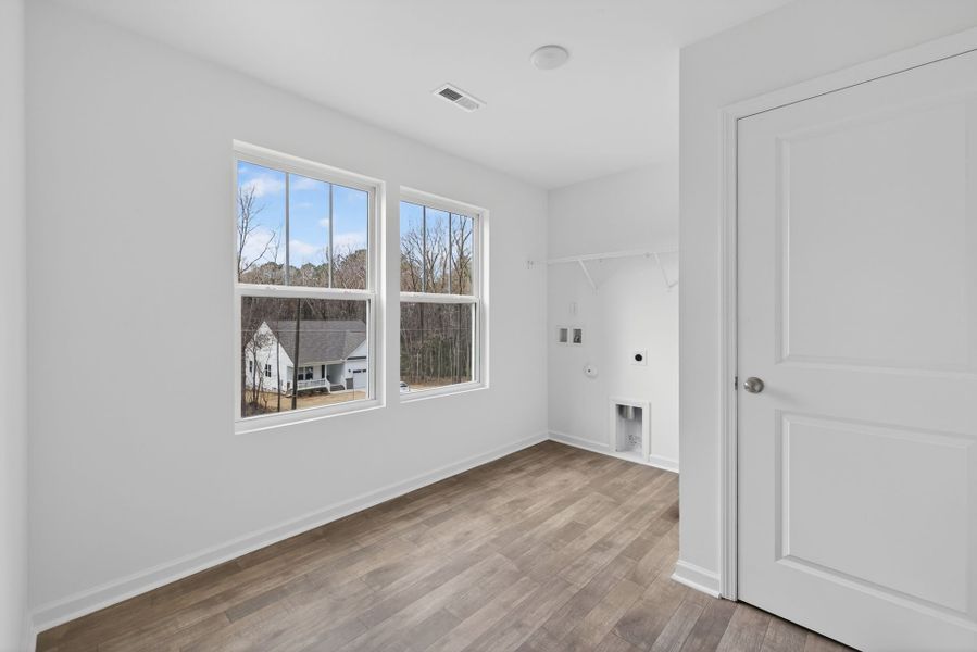 Spacious, unfurnished interior of a new home in Lake Royale, Louisburg (Image 22).