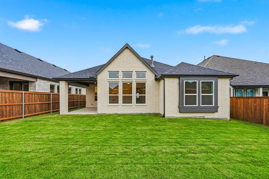 Exterior details and patio area of a home in Waterscape: 50ft. lots, Royse City (Image 1).