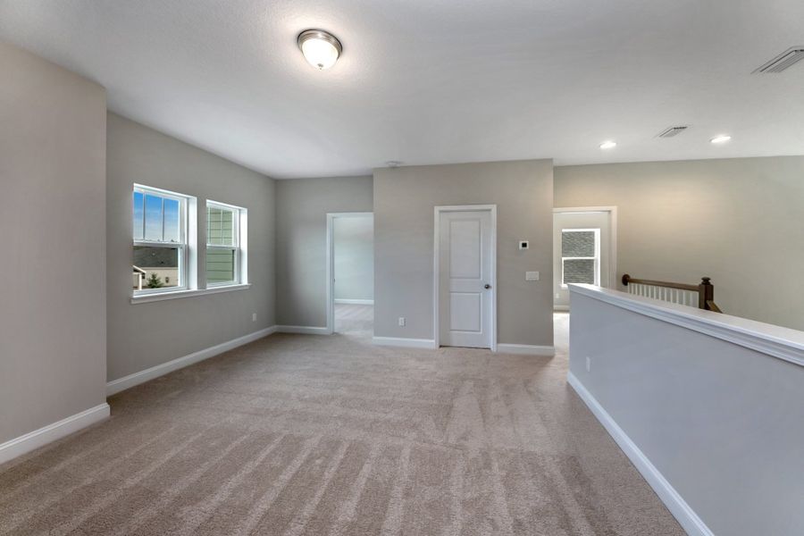 Representative unfurnished interior of a home built from the Walton by Riverside Homes in Mariposa at EverRange, Jacksonville (Image 42).