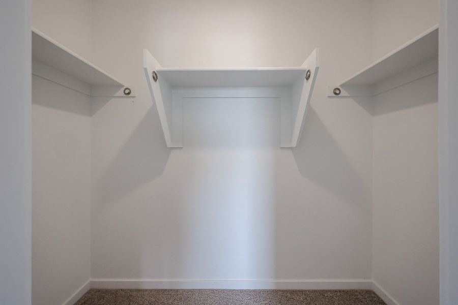 A white staircase with a door. A white staircase with a door.