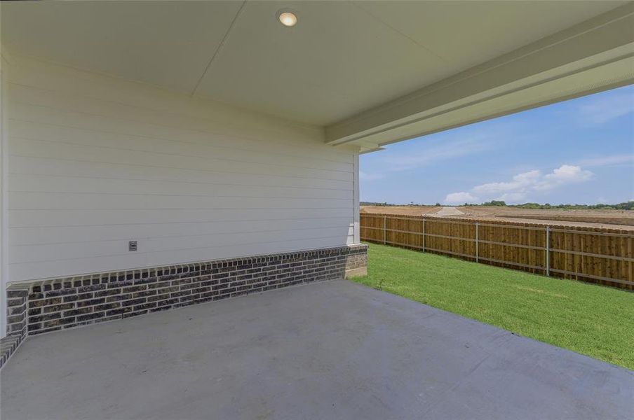Covered patio featuring a concrete slab and recessed lighting Covered patio featuring a concrete slab and recessed lighting