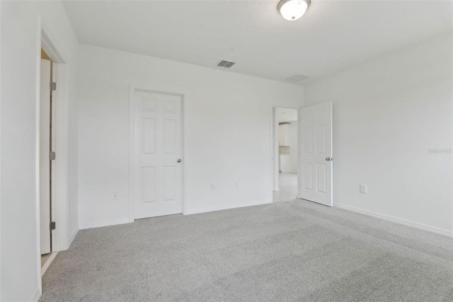 Spacious, unfurnished interior of a new home in Springs at Lake Alfred - Signature Series, Lake Alfred (Image 27).