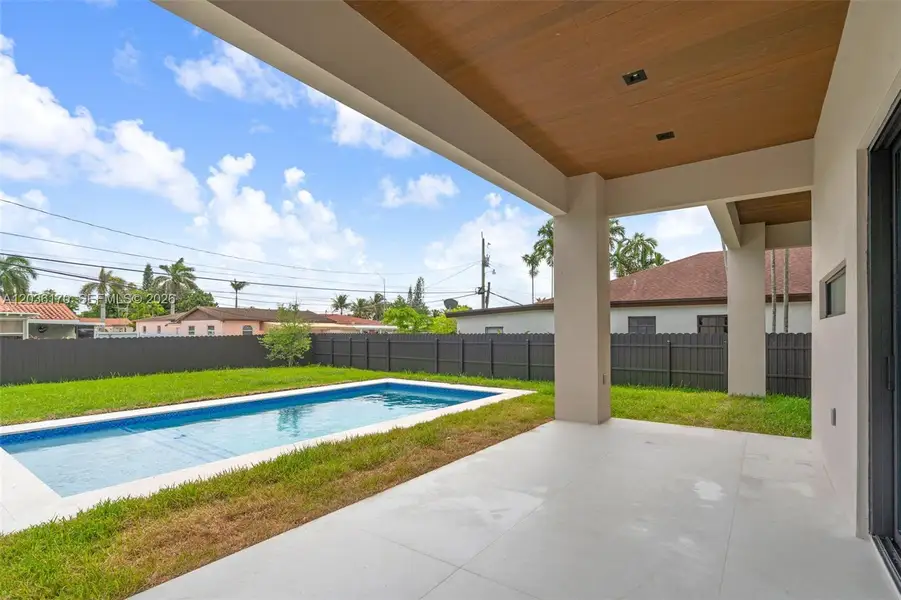 Exterior details and patio area of a home in , Miami (Image 3). Exterior details and patio area of a home in , Miami (Image 3).