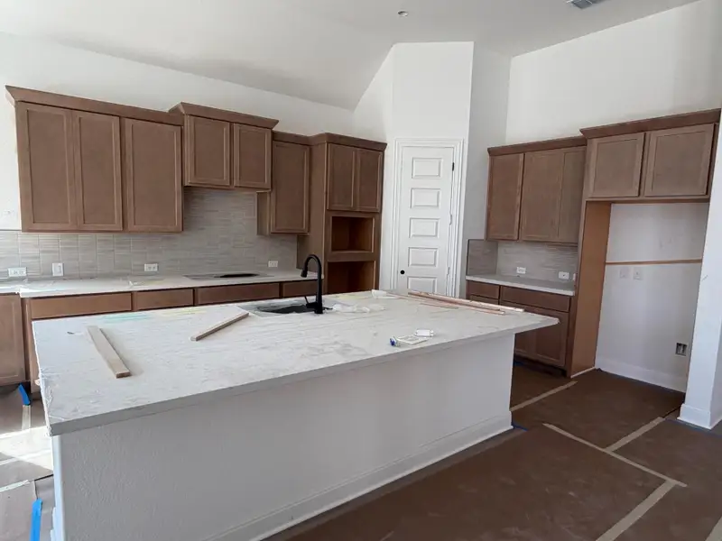 In-progress construction of a new home in Hawkes Landing, Leander, TX (Image 8).