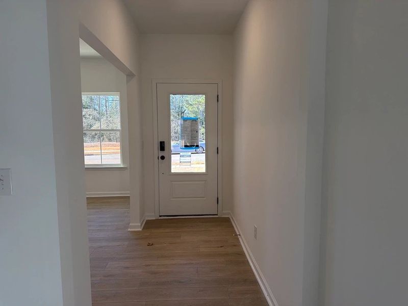 Foyer featuring the AW Collection® Sapphire - Bright white meets bold blue for a daring welcome.