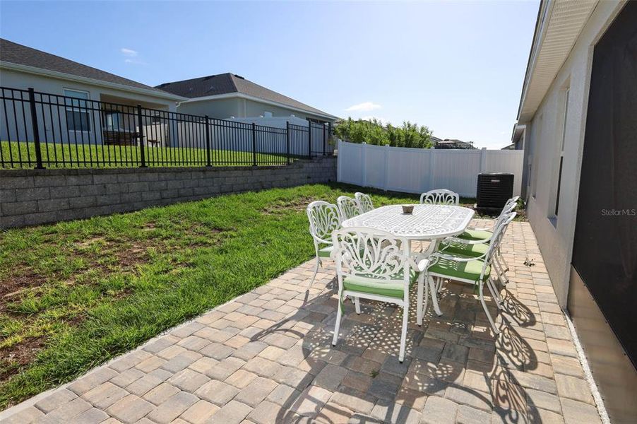 Exterior details and patio area of a home in Geneva Landings, Davenport (Image 20). Exterior details and patio area of a home in Geneva Landings, Davenport (Image 20).