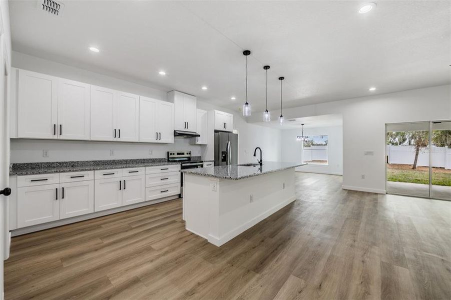 Furnished interior view inside a new home in , Dade City (Image 8).
