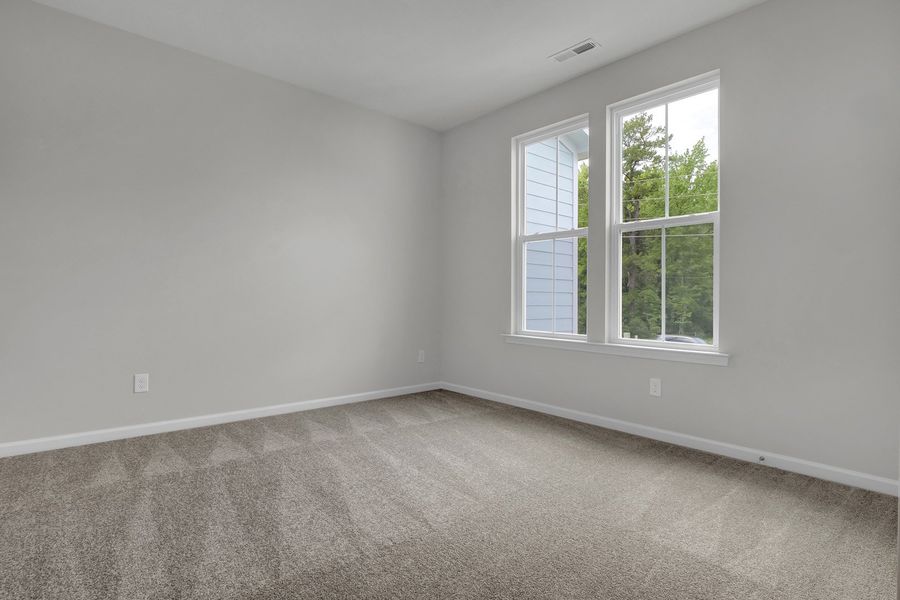Spacious, unfurnished interior of a new home in Grand Park, Leland (Image 25). Spacious, unfurnished interior of a new home in Grand Park, Leland (Image 25).