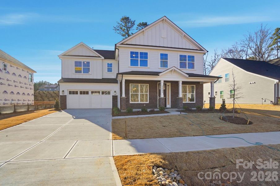 Front exterior of a new home in Rone Creek, Waxhaw, NC, highlighting curb appeal (Image 2).
