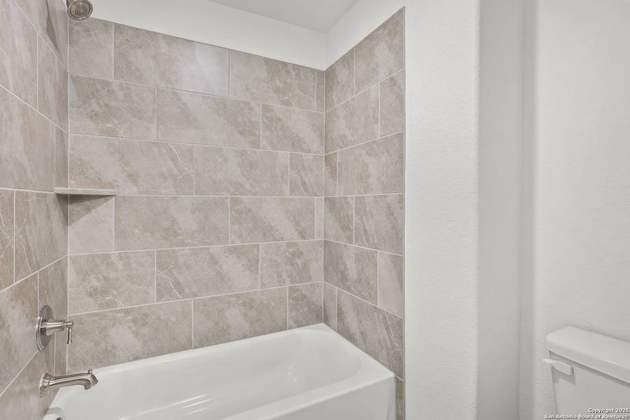 Furnished interior view inside a new home in Ladera, San Antonio (Image 37).