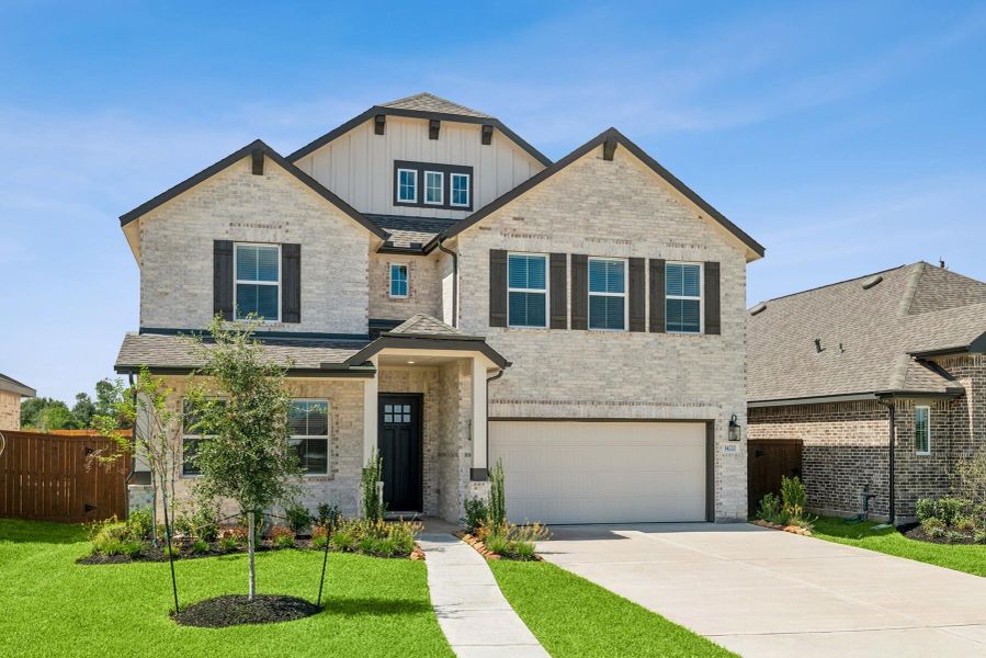 Front exterior of a new home in Harvest Pointe, Needville, TX, highlighting curb appeal (Image 16). Front exterior of a new home in Harvest Pointe, Needville, TX, highlighting curb appeal (Image 16).