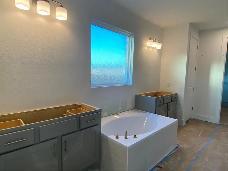 Primary Bath retreat with dual vanities & garden tub Primary Bath retreat with dual vanities & garden tub