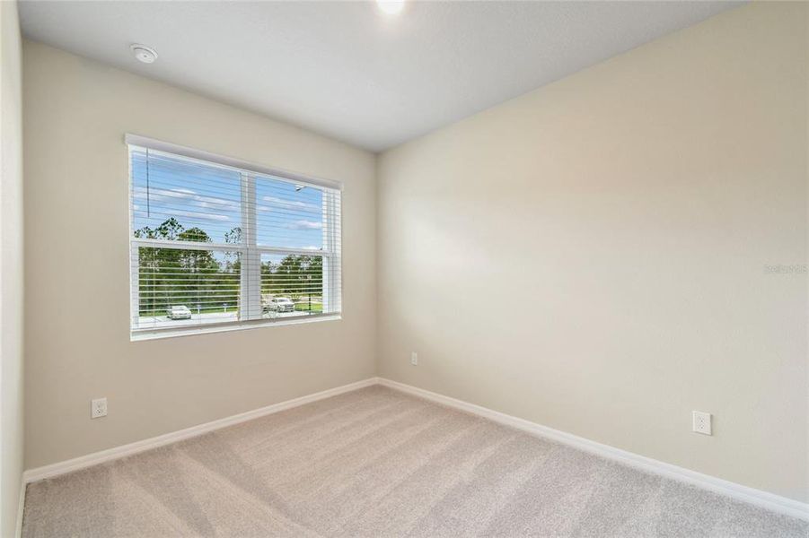 Spacious, unfurnished interior of a new home in Preserve at The Cays – The Harbor Series, Daytona Beach (Image 13). Spacious, unfurnished interior of a new home in Preserve at The Cays – The Harbor Series, Daytona Beach (Image 13).