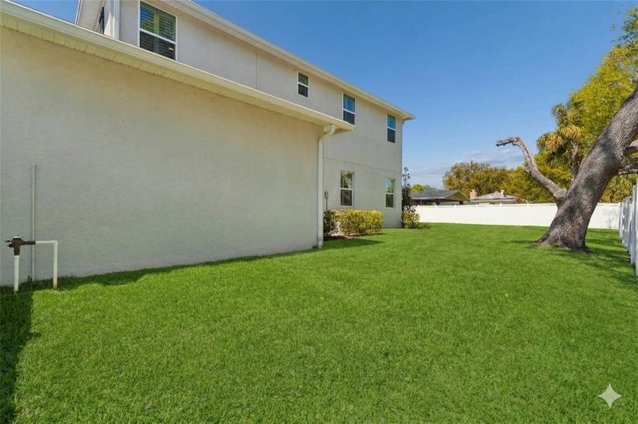 Exterior details and patio area of a home in , Tampa (Image 25).