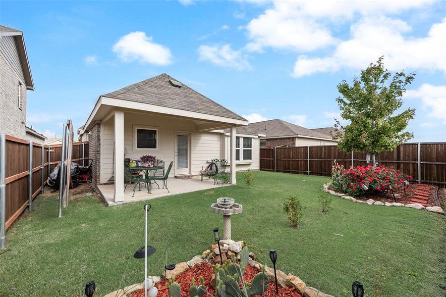 Exterior details and patio area of a home in Walden Pond, Forney (Image 3).