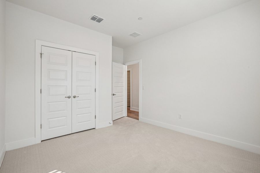 Spacious, unfurnished interior of a new home in Koenig Townhomes, Austin (Image 25).