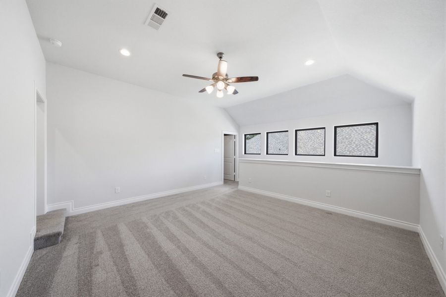 Spacious, unfurnished interior of a new home in The Woodlands Hills 65′, Willis (Image 38).