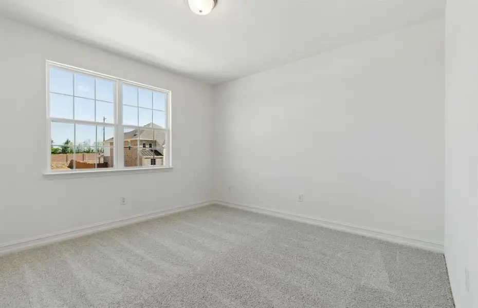 Airy secondary bedroom Airy secondary bedroom