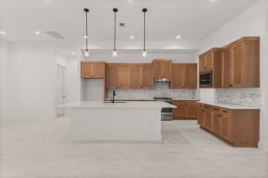 Representative furnished interior of a home built from the Sorenstam by Chesmar Homes in Riceland Alley Loads, Mont Belvieu (Image 47).