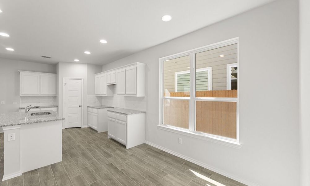 Representative exterior photo of a completed home built from the Thorndale by Impression Homes in Heartland, Heartland, TX (Image 10). Representative exterior photo of a completed home built from the Thorndale by Impression Homes in Heartland, Heartland, TX (Image 10).