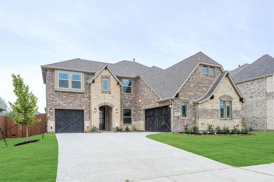 Front exterior of a new home in Mockingbird Heights Classic 60, Midlothian, TX, highlighting curb appeal (Image 1).