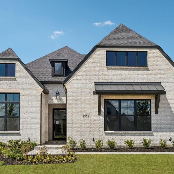 Front exterior of a new home in StarView, Prosper, TX, highlighting curb appeal (Image 25).