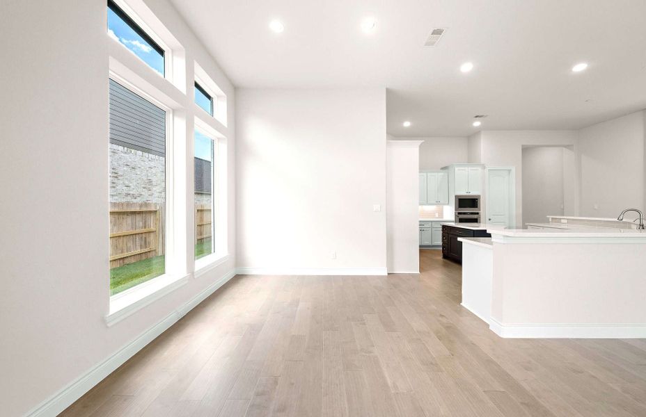 Representative unfurnished interior of a home built from the 2855AU by Ravenna Homes in Audubon 60′, Magnolia (Image 26).
