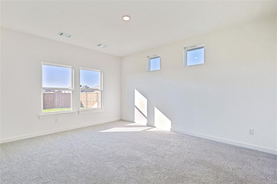 View of carpeted spare room