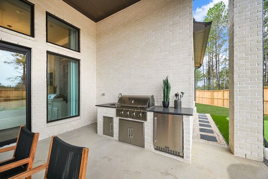 Exterior details and patio area of a home in Wildtree 70', Montgomery (Image 22).