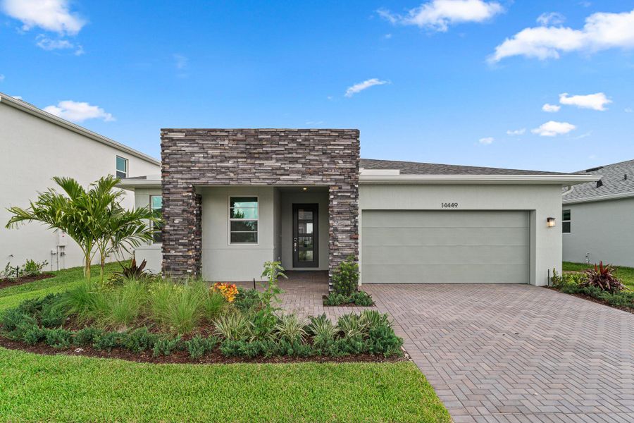 Exterior details and patio area of a home in Tradition - Cadence, Port St. Lucie (Image 1).
