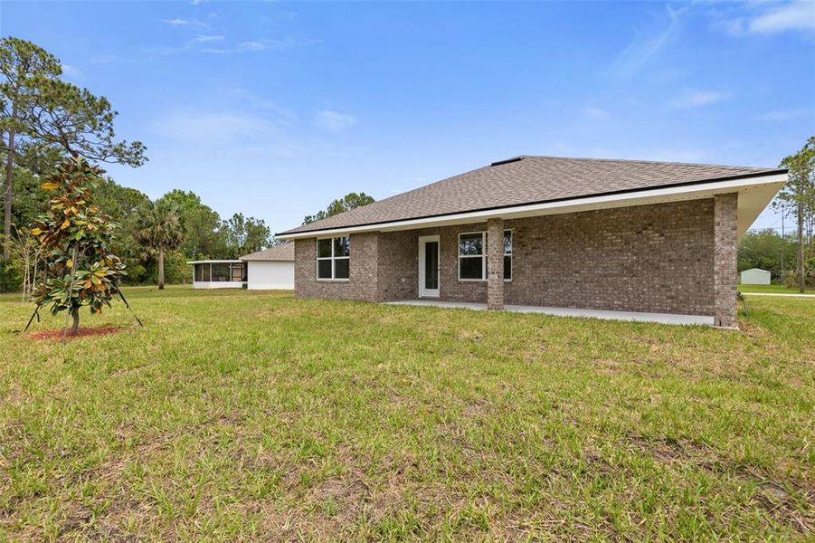 Exterior details and patio area of a home in Palm Coast, Palm Coast (Image 16). Exterior details and patio area of a home in Palm Coast, Palm Coast (Image 16).