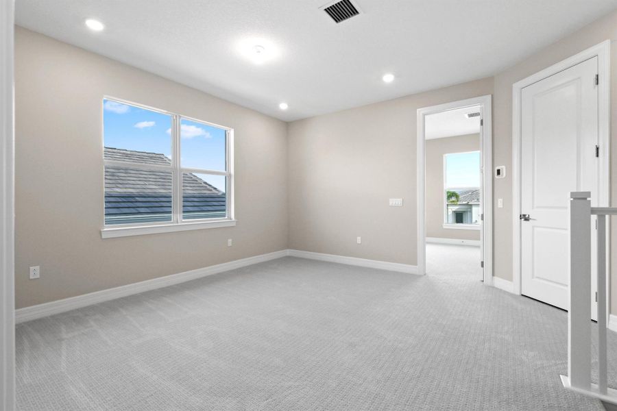 Furnished interior view inside a new home in Avondale at Avenir, Palm Beach Gardens (Image 20).