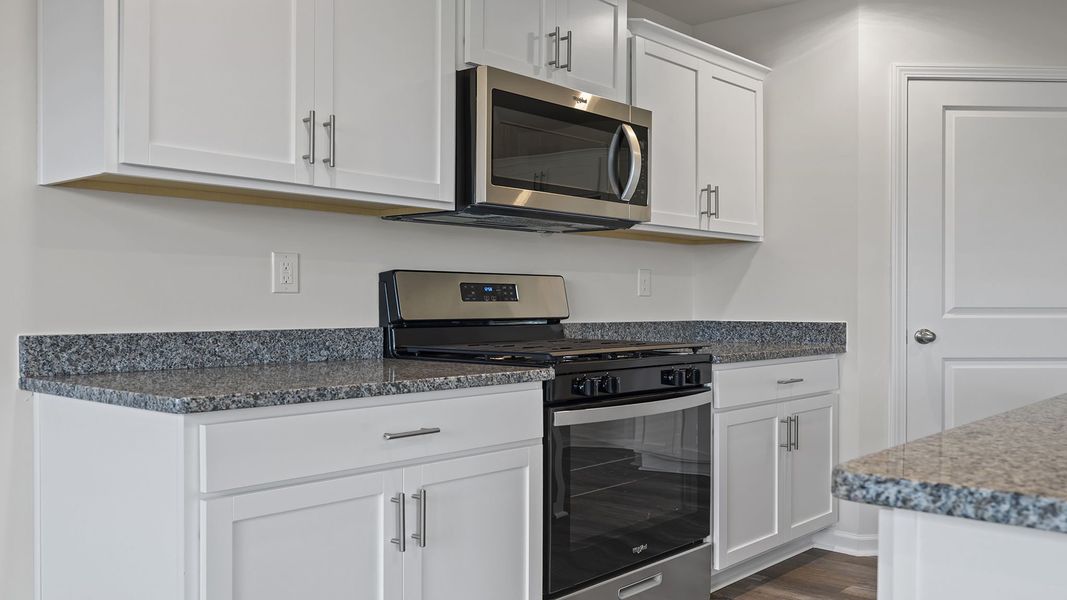 Furnished interior view inside a new home in Village Grove, Greenville (Image 7).