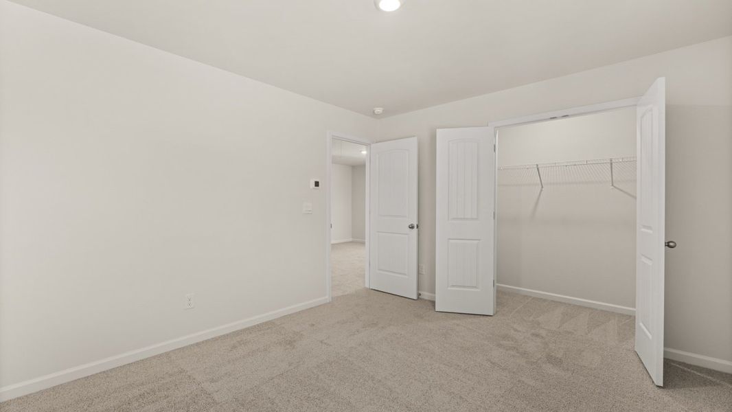 Representative unfurnished interior of a home built from the WINDSOR by D.R. Horton in Butner Estates, South Fulton (Image 64).