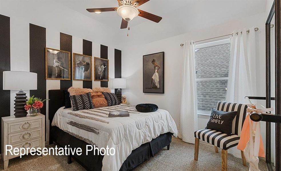 Bedroom with carpeted flooring, a ceiling fan with integrated lighting, and a single window