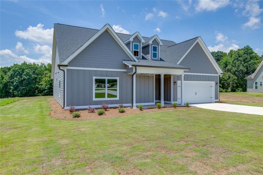 Front exterior of a new home in , Hartwell, GA, highlighting curb appeal (Image 19).